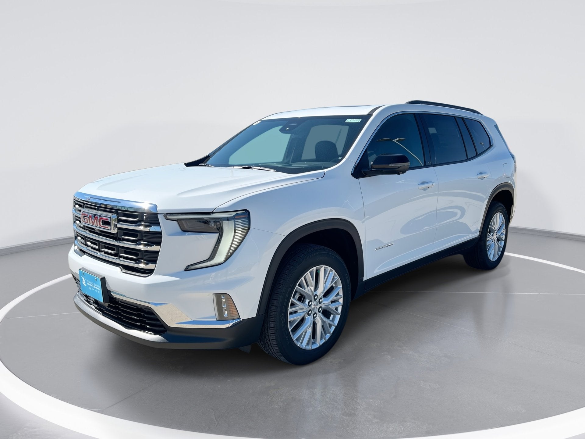 2026 GMC Acadia Elevation in Summit White — front three-quarter view