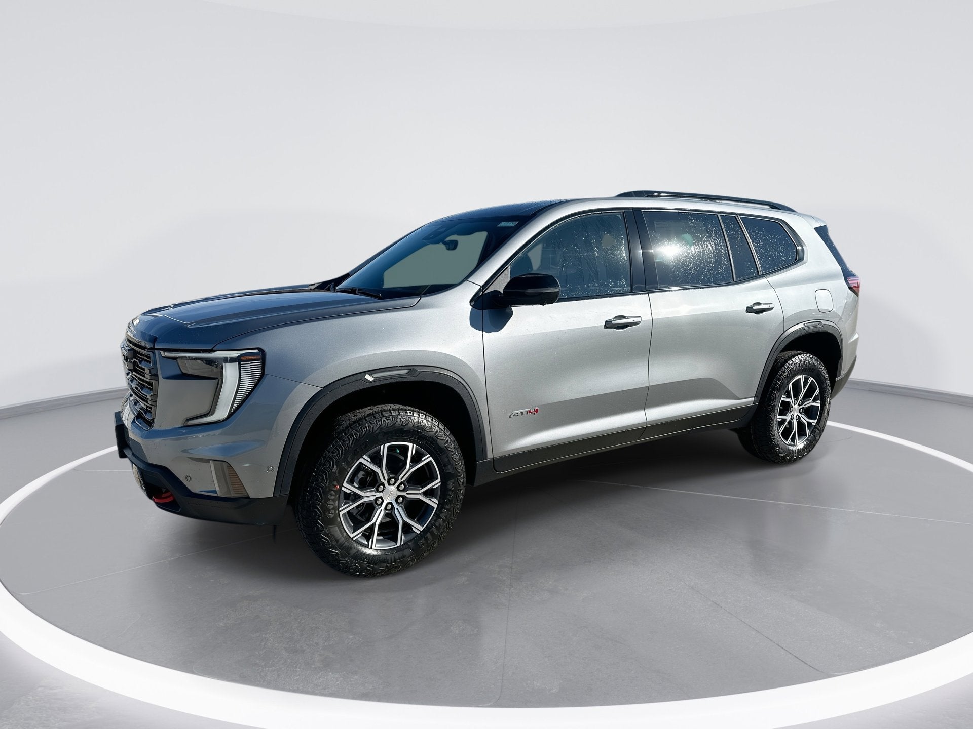 2026 GMC Acadia AT4 in Sterling Metallic — front three-quarter view