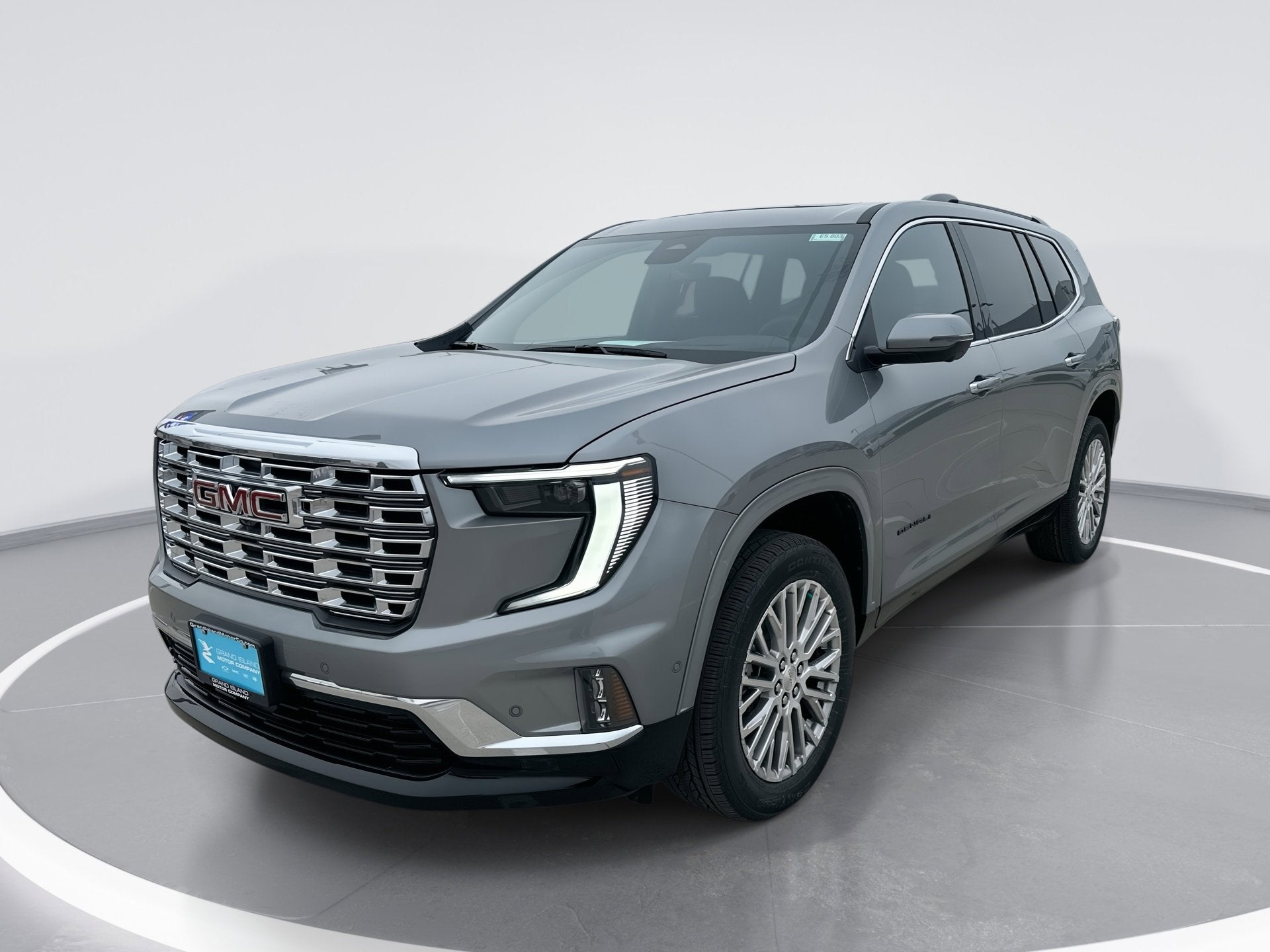 2026 GMC Acadia Denali in Sterling Metallic — front three-quarter view