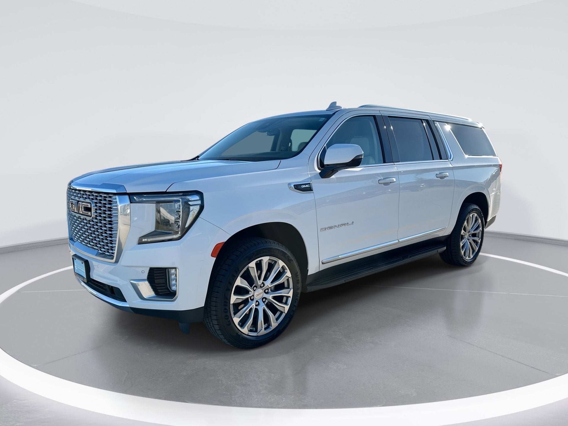 2023 GMC Yukon XL Denali in Summit White — front three-quarter view
