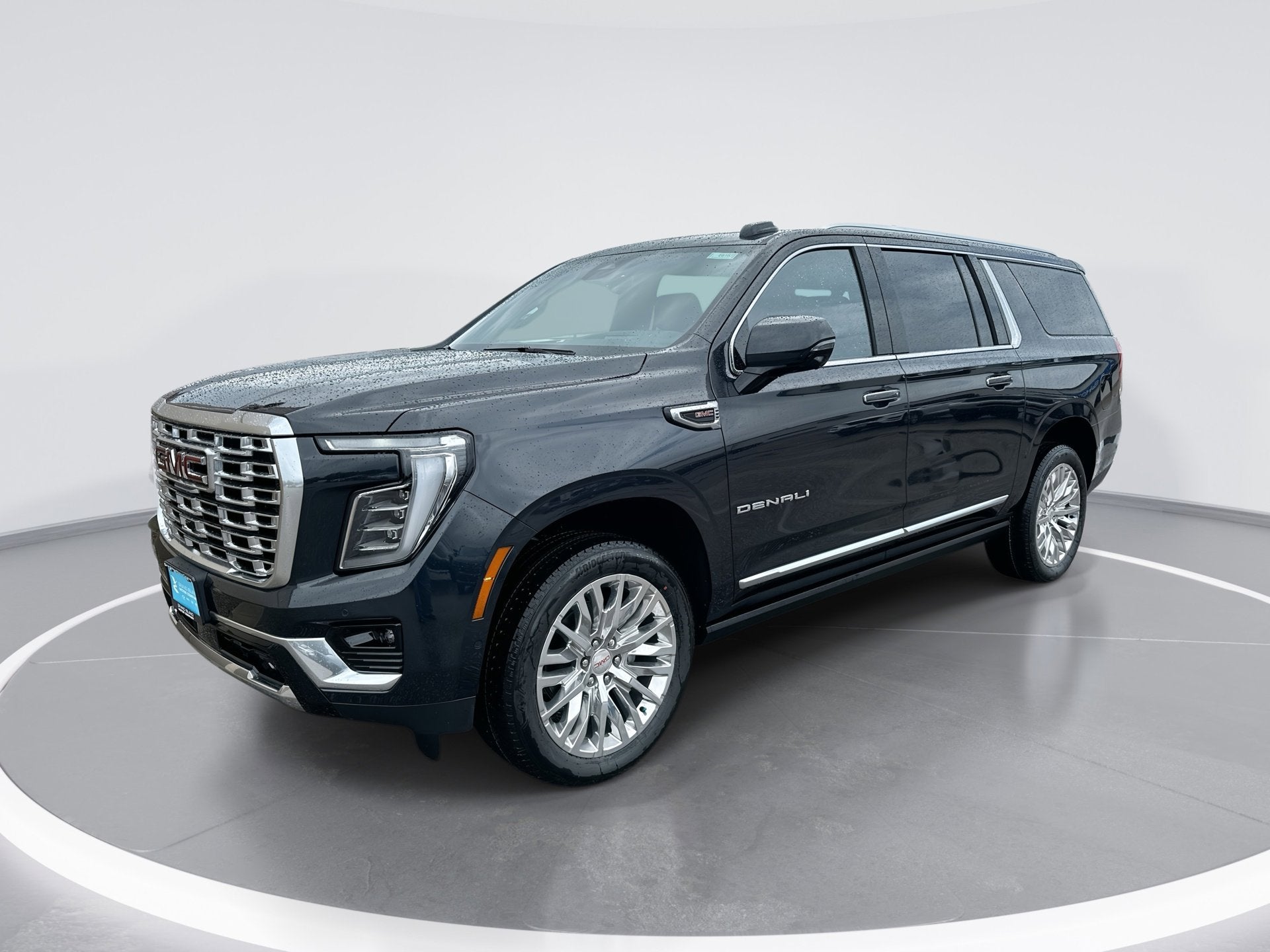 2026 GMC Yukon XL Denali in Titanium Rush Metallic — front three-quarter view