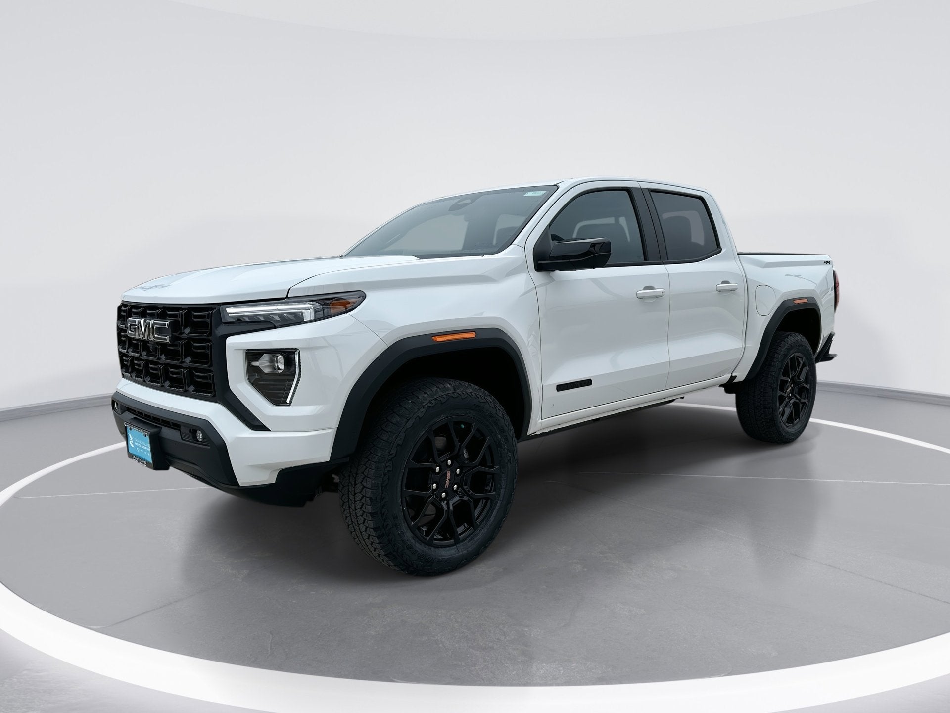 2026 GMC Canyon Elevation in Summit White — front three-quarter view