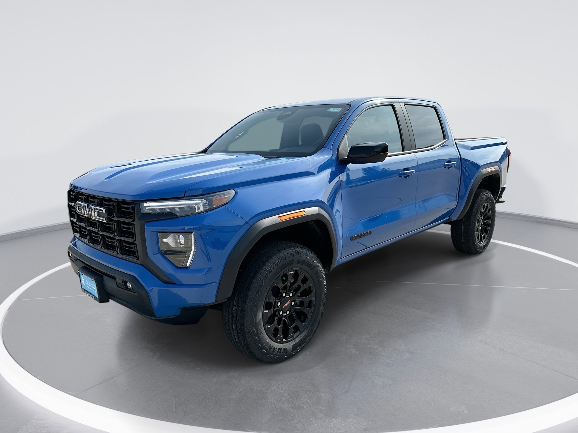 2026 GMC Canyon Elevation in Rapids Metallic — front three-quarter view
