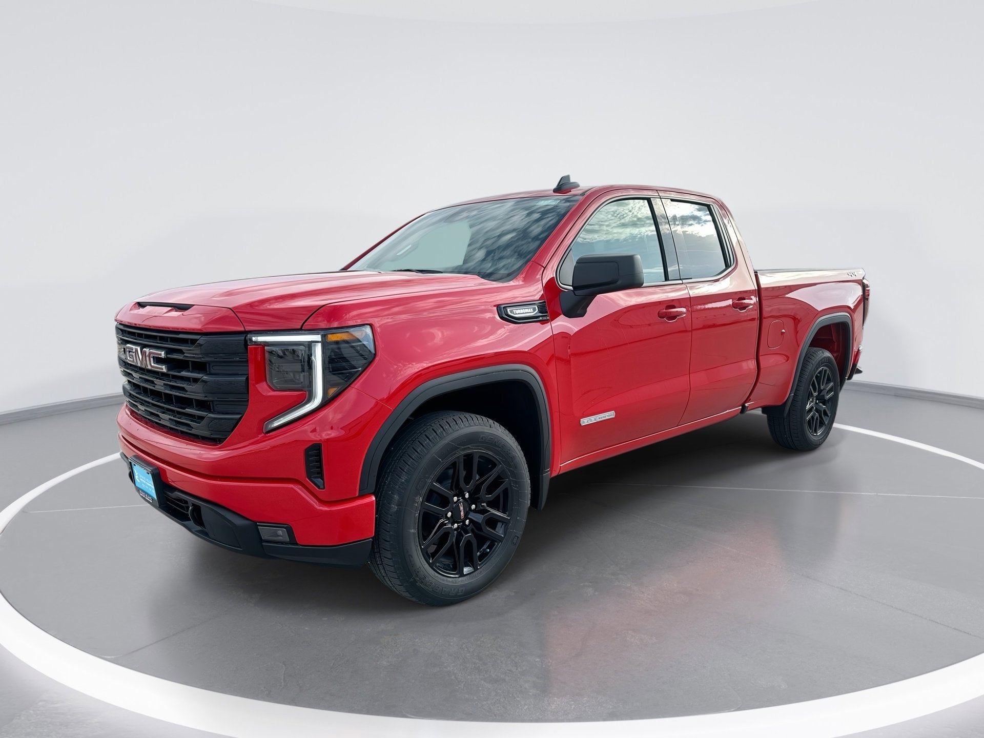 2026 GMC Sierra 1500 Elevation in Cardinal Red — front three-quarter view