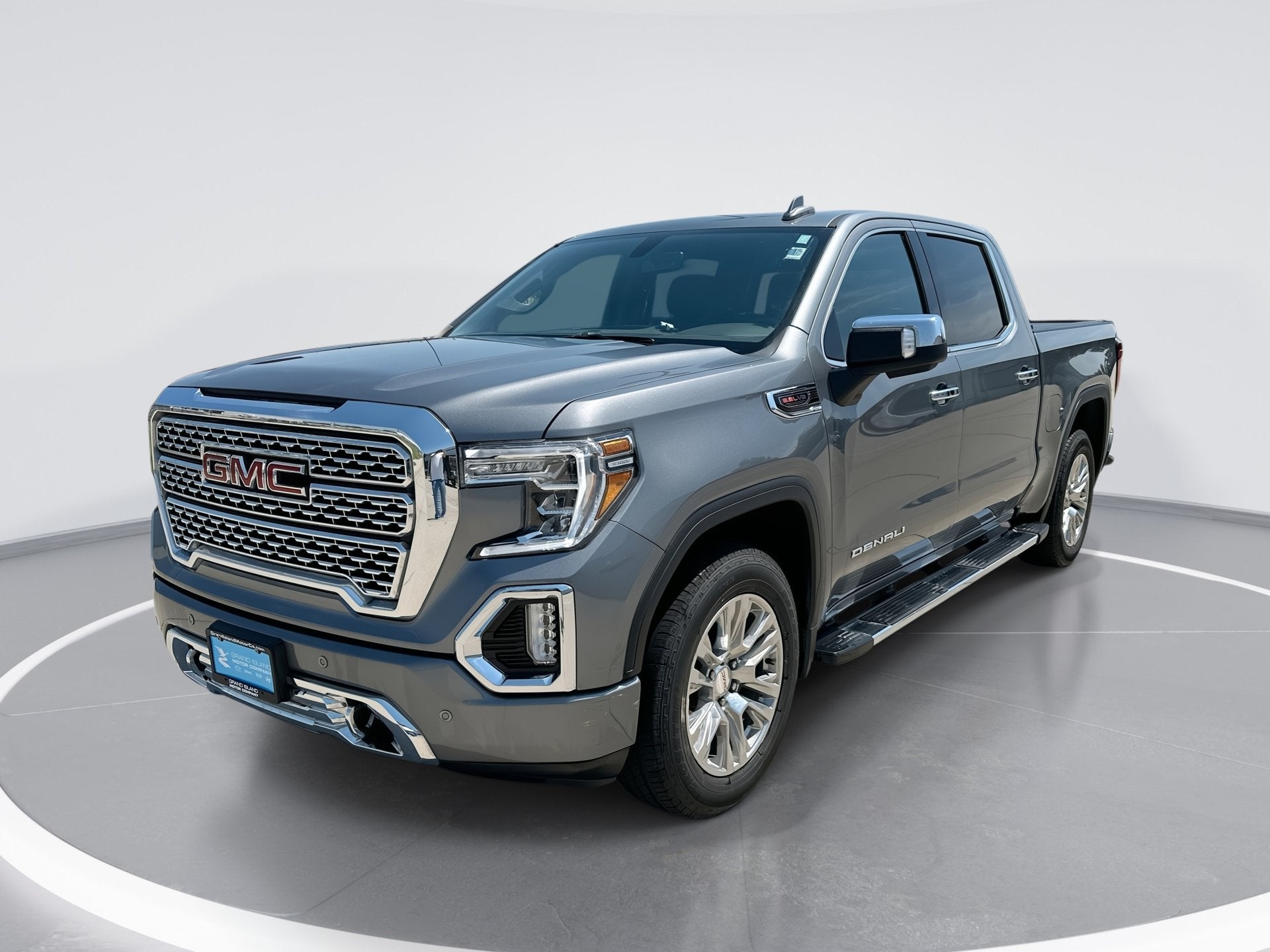 2021 GMC Sierra 1500 Denali in Satin Steel Metallic — front three-quarter view