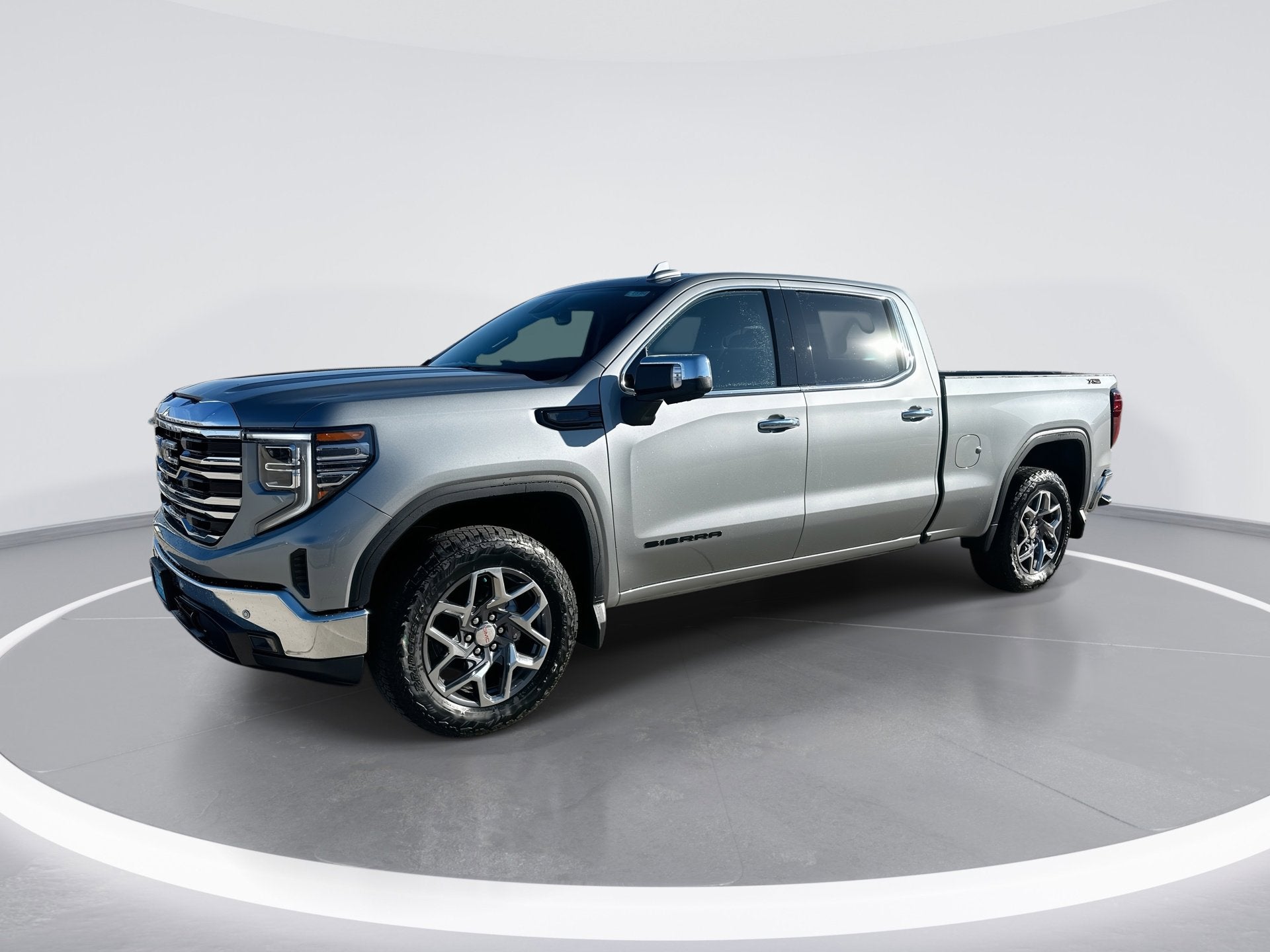 2026 GMC Sierra 1500 SLT in Sterling Metallic — front three-quarter view