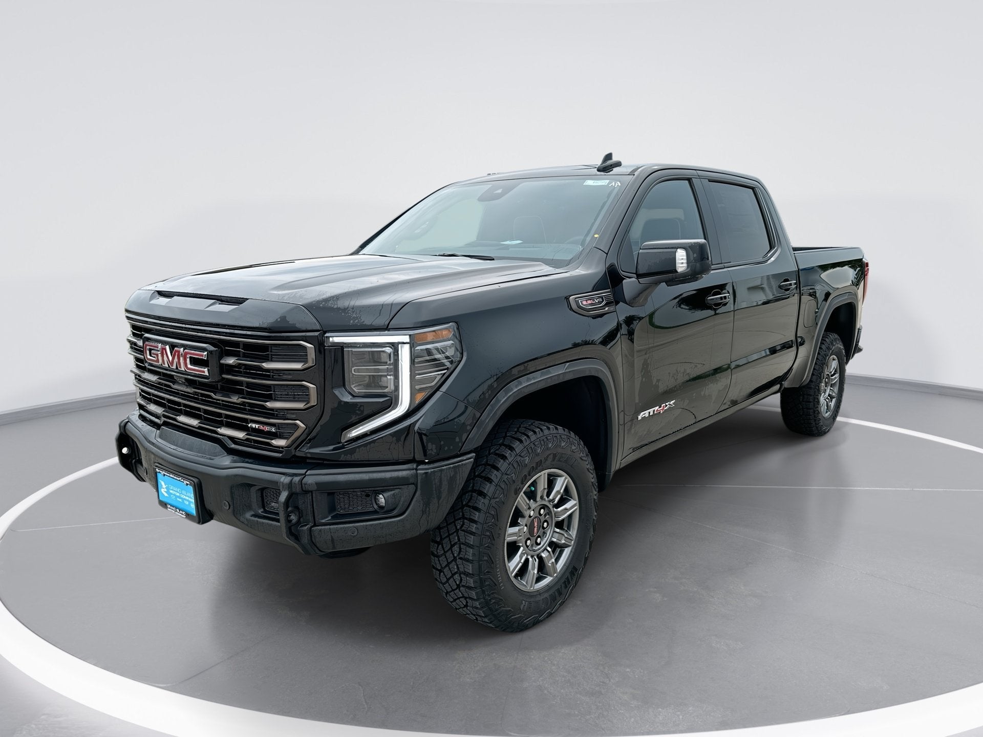 2026 GMC Sierra 1500 AT4X in Onyx Black — front three-quarter view