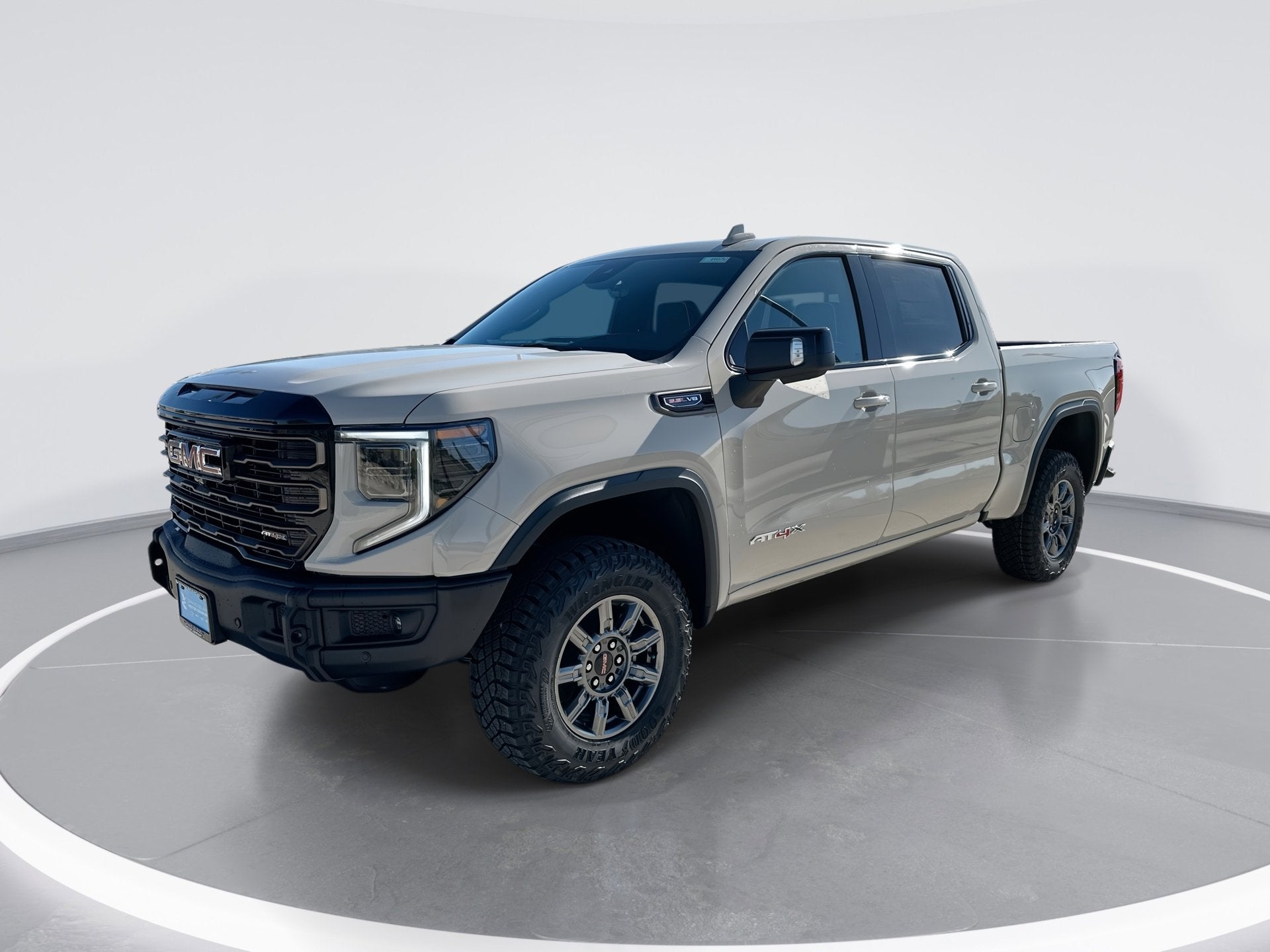 2026 GMC Sierra 1500 AT4X in Coastal Dune — front three-quarter view